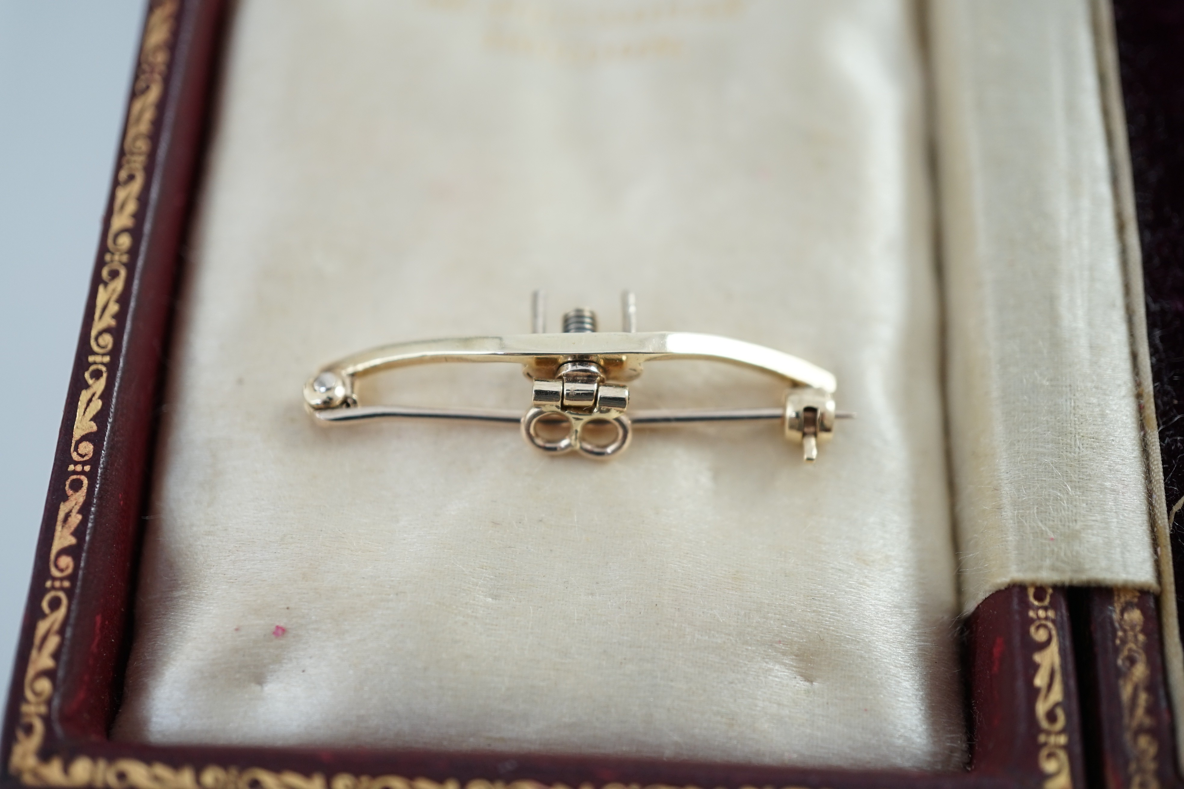 A Victorian gold, silver and graduated diamond cluster set target drop pendant brooch, retailed by Carlo & Arthur Giuliano